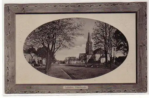 57642 geprägte Ak Letschin Oderbruch Straßenansicht mit Kirche 1912