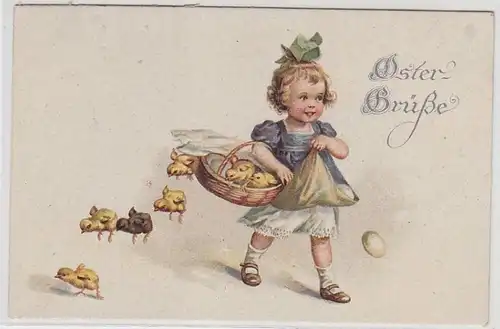 48234 Pâques Ak Enfant avec panier plein de poussins et d'œufs vers 1920