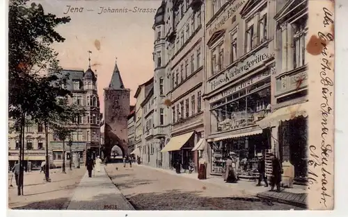 42969 Ak Jena Johannisstrasse mit Geschäften um 1910