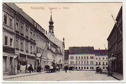 39973 Ak Radeberg Hauptstrasse und Markt um 1910