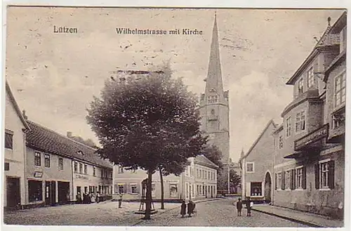 38211 Ak Lützen Wilhelmstraße mit Kirche 1912