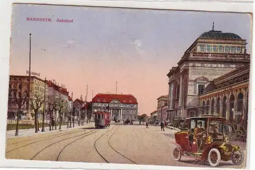 37368 Ak Mannheim Bahnhof Auto und Straßenbahn um 1910