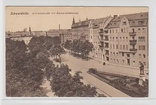 24652 Ak Schweidnitz Wilhelmstraße avec monument à Bismarck