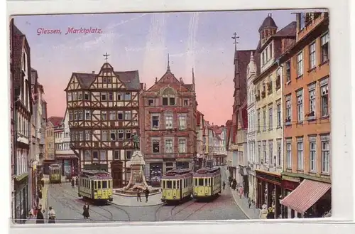 21772 Ak Giessen Marktplatz mit Straßenbahnen um 1915