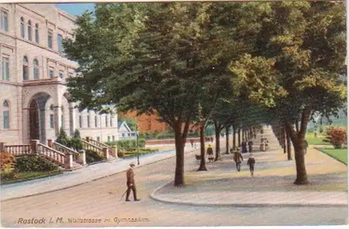 19399 Ak Rostock Wallstraße mit Gymnasium um 1910