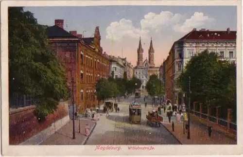 13867 Ak Magdeburg Wilhelmstraße mit Straßenbahn 1921