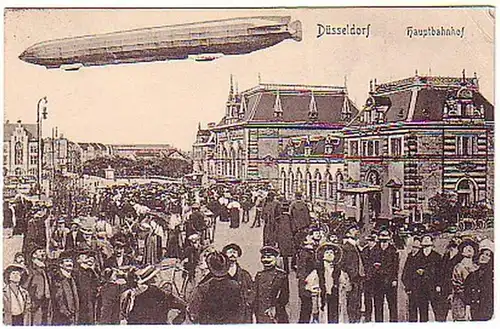 13486 Ak Zeppelin über Düsseldorf Hauptbahnhof 1912
