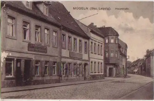 12996 Ak Mügeln (Bez. Leipzig) Hauptstrasse um 1915