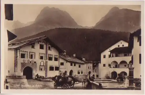 12533 Foto Ak Dorfplatz in Schuls mit Fuhrwerk um 1930