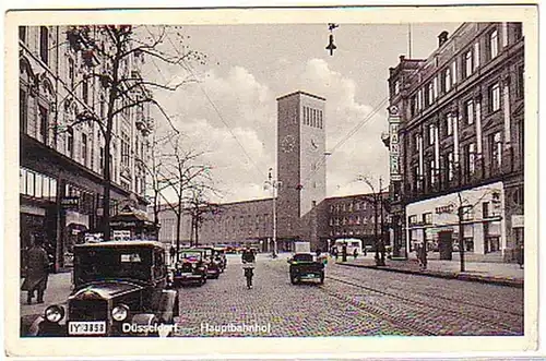 03404 Ak Düsseldorf Hauptbahnhof mit Verkehr 1940