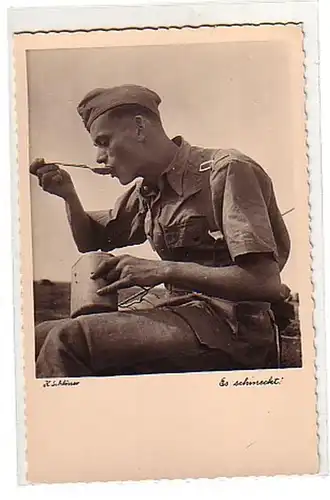 00580 Photo campagne africaine Soldat avec ustensiles de cuisine vers1942