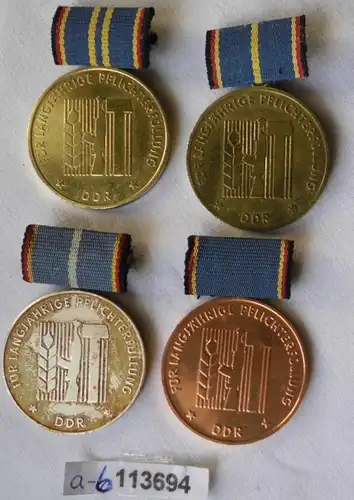 4 x DDR Ordre Défense nationale Or Argent et Bronze (113694)