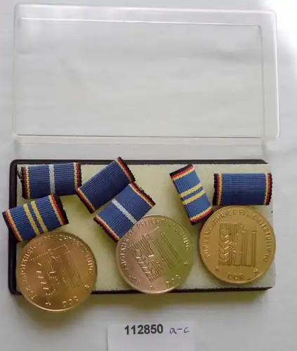 3 x DDR médailles Défense nationale Or Argent Bronze dans l'Etui (112850)