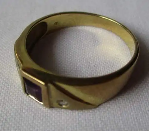 hübscher Damen Ring aus 333er Gold mit weißem und violettem Edelstein (120242)