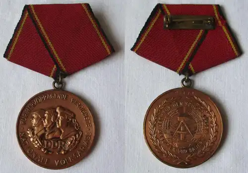 DDR Verdienstmedaille der NVA Nationale Volksarmee Bronze Bartel 147 a (153595)