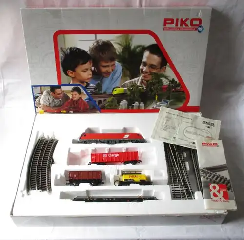 PIKO H0 Start-Set E-Lok 1016 005-9 mit 4 Kessel- und Güterwagen (111548)