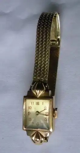 belle montre femme or 585 or 14 K avec bracelet en or 585.