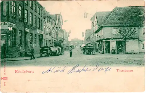 Rendsburg Thorgasse, Gasthaus, geschäften u. Personen, beschriftete sw-AK