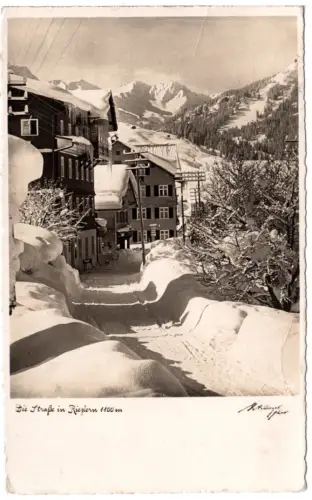 Österreich, Riezlern, Strasse m. Gebäuden, 1938 gebr. Kleinwalsertal Winter-AK 