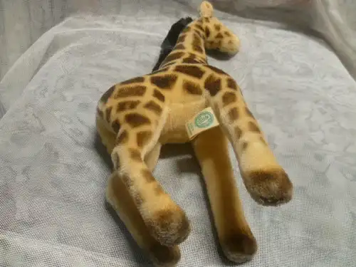 Hermann Teddy mit Markenschild  stehende Giraffe ca. 33 cm hoch  von Kopf bis Fuß gemessen  unbespielten guten Zustand