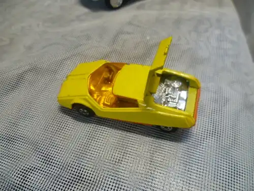Datsun 128X  von 1973 Chassi gelb Fahrwerk orange No: 123 8927