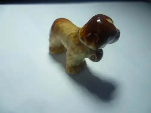 1 Paar Modelle eines Bernhardiners  Porzellan wohl Schweiz oder Erzgebirge  um 1920 M : 50 mm X 35 mm