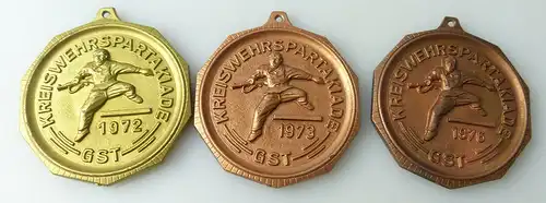 3 Medaillen : Kreiswehrspartakiade GST 1976,1973,1972 / r 476