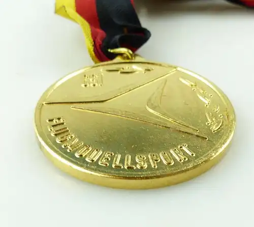 e10421 Medaille GST Meisterschaft der DDR Flugmodellsport goldfarben mit Band