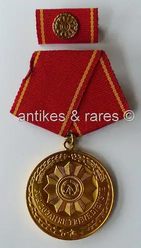 Medaille treue Dienste bewaffnete Organe des MdI in Gold 20 Dienstjah (Orden809)