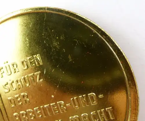 #e8047 Medaille: Zollverwaltung der DDR goldfarben  defekt