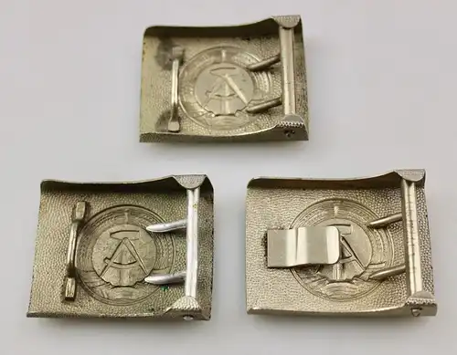 e11872 3 verschiedene DDR Koppelschlösser Silber 2 alte Ausführungen