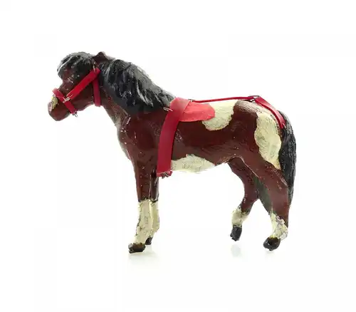 e9409 Antikspielzeug Tier Masse Figur Lineol Pony weiß gescheckt mit Zaumzeug