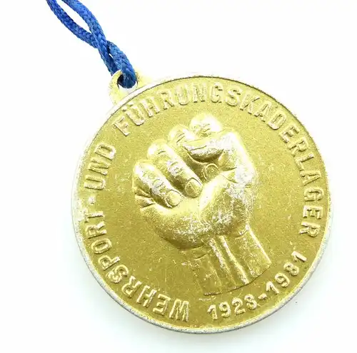 #e5644 Medaille Wehrsport- und Führungskaderlager 1928 - 1981 goldfarben GST