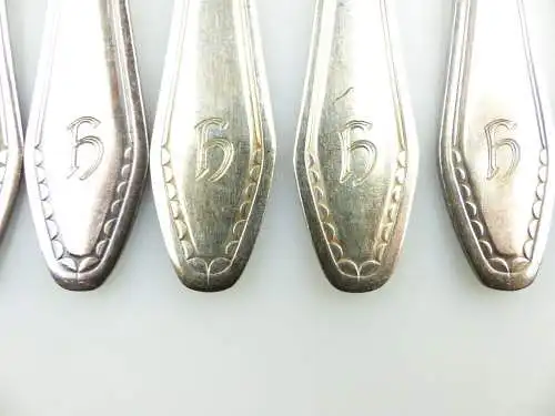 e11384 26 teiliges versilbertes Besteck 12 Messer 12 Gabeln 2 Vorlegelöffel