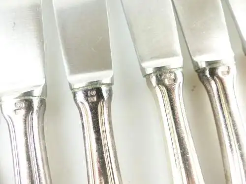 e11384 26 teiliges versilbertes Besteck 12 Messer 12 Gabeln 2 Vorlegelöffel