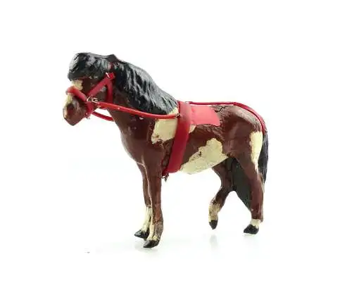 e9417 Antikspielzeug Tier Masse Figur Lineol Pony weiß gescheckt mit Zaumzeug