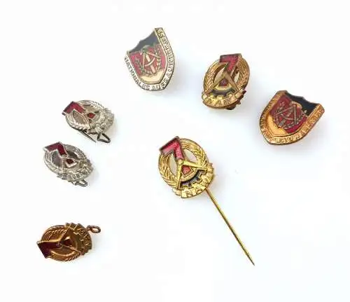 #e7421 7x Abzeichen Nationales Aufbauwerk Berlin silber, Bronze und Gold