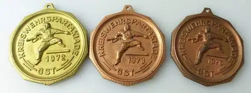 3 Medaillen : Kreiswehrspartakiade GST 1976,1973,1972 / r 476