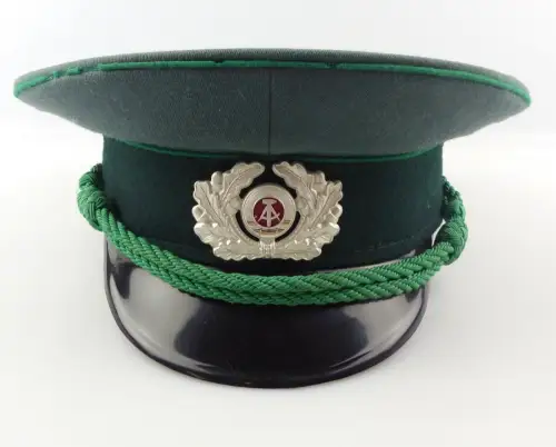 e10890 Original DDR MdI Schirmmütze von 1970 Größe 56 mit Mottenschäden