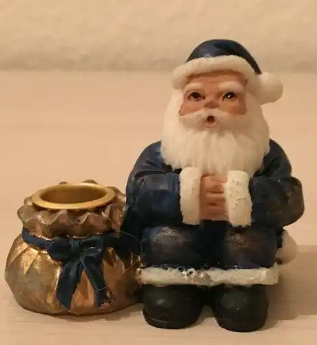 Weihnachtsschmuck,  Weihnachtsmann sitzend, Kerzenständer , aus Alabastergips