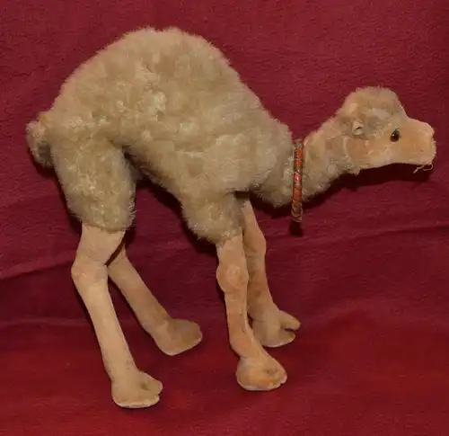 Zwei Stofftiere,Kamel u. Hund, wohl Steiff,um 1950,besch.für Restaurator