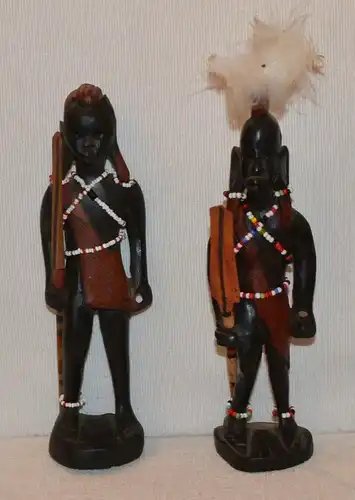 Zwei afrikanische Figuren,Holz geschnitzt, mit Rudern in den Händen,20.Jhdt.