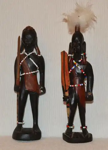 Zwei afrikanische Figuren,Holz geschnitzt, mit Rudern in den Händen,20.Jhdt.