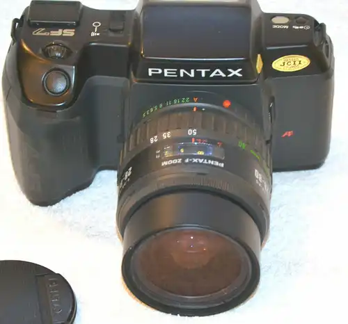 Pentax SF 7, Spiegelreflexkamera,Pentax-F Zoom 1:3,5-4,5.Mit Gebrauchsanleitung