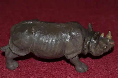 Spielzeugfigur, Tierfigur aus Masse, etwa 1930,Nashorn, handbemalt