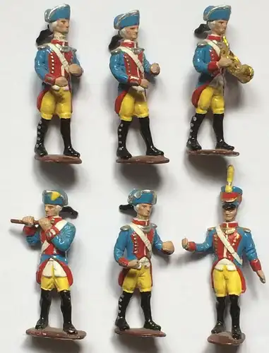 Sechs Spielzeugsoldeten eines Musikkorps in französischer (?) Uniform, ca. 1900