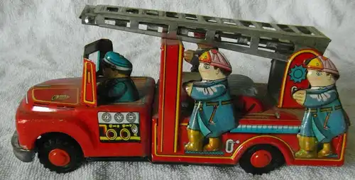 Blechspielzeug Feuerwehrauto mit Schwungradantrieb und ausziehbarer Leiter