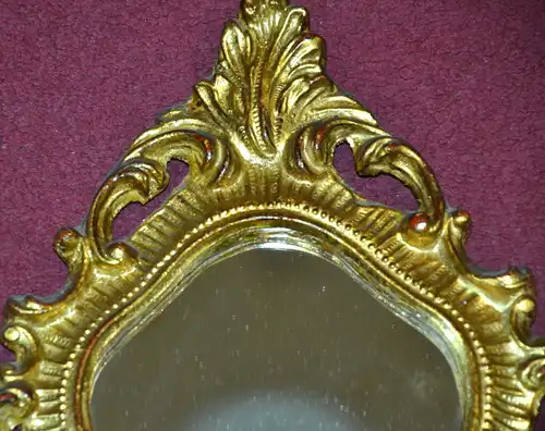 Ovaler Spiegel,Holz geschnitzt und Stuck, wohl Anfang 20.Jhdt,vergoldet