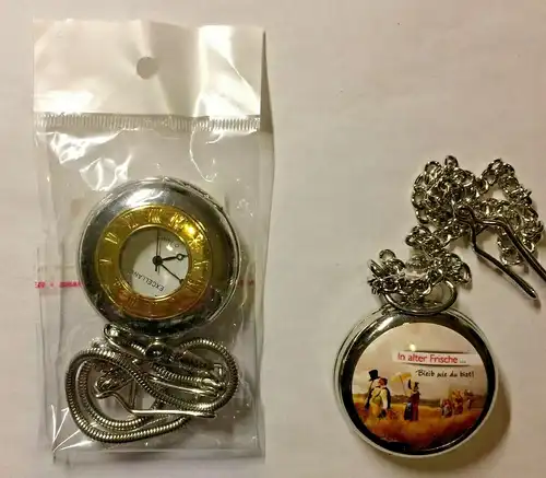 Zwei kl.Taschenuhren,Quarz, in Originalverpackung, eine mit Motiv Carl Spitzweg