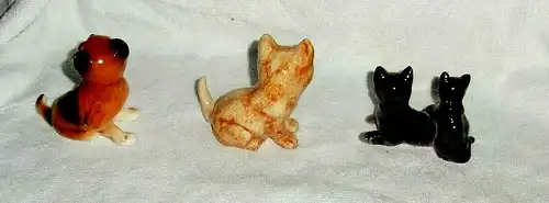 7 kleine Deko-Katzenfiguren ohne Marke